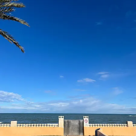 Frente Al Mar, Talima *